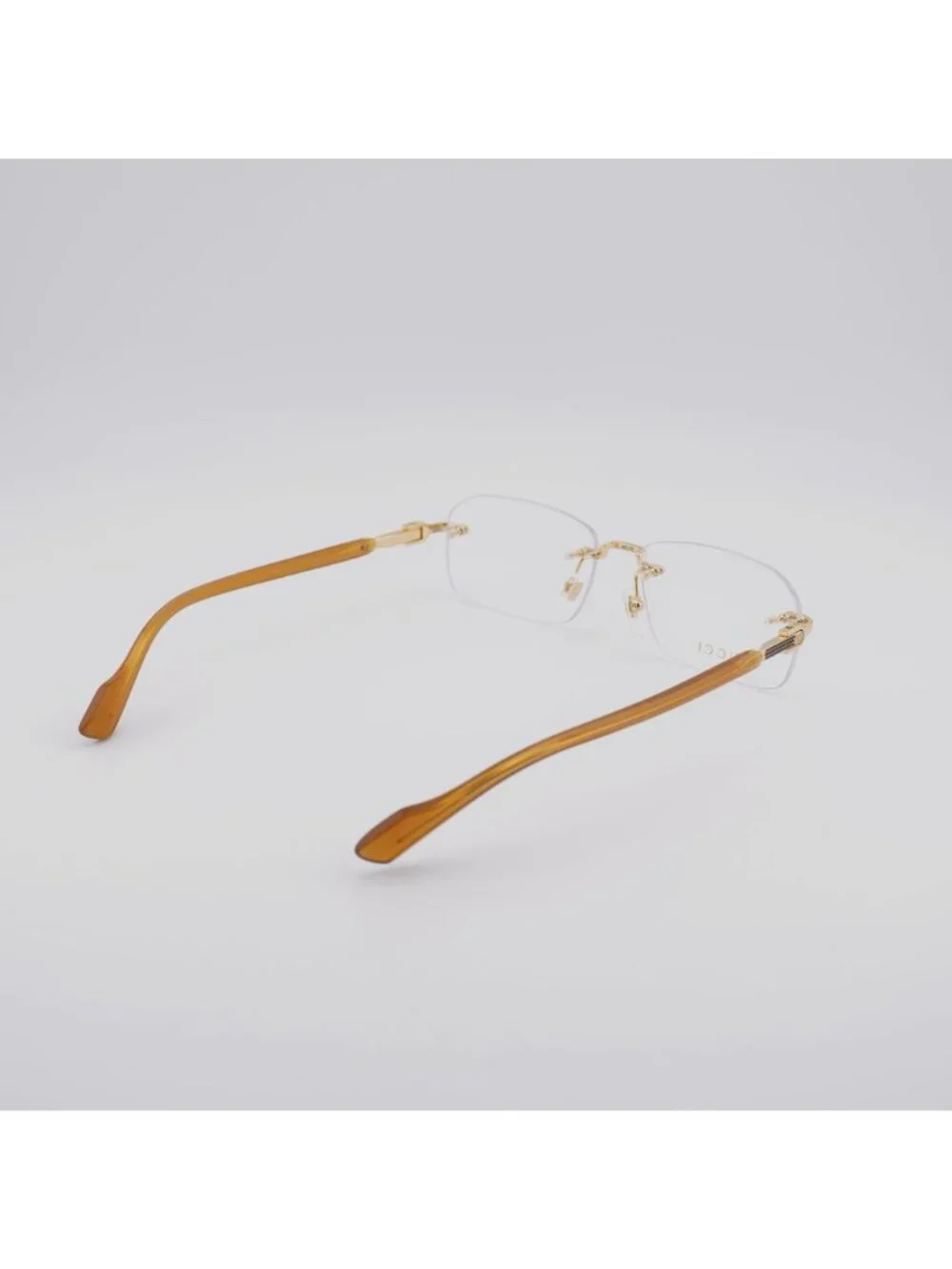 Gucci GG1221O 006 Rimless Eyeglasses Gold 56mm Rectangle Frame